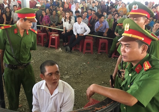 Ky su cam sung cuop ngan hang thoat an tu hinh anh 1