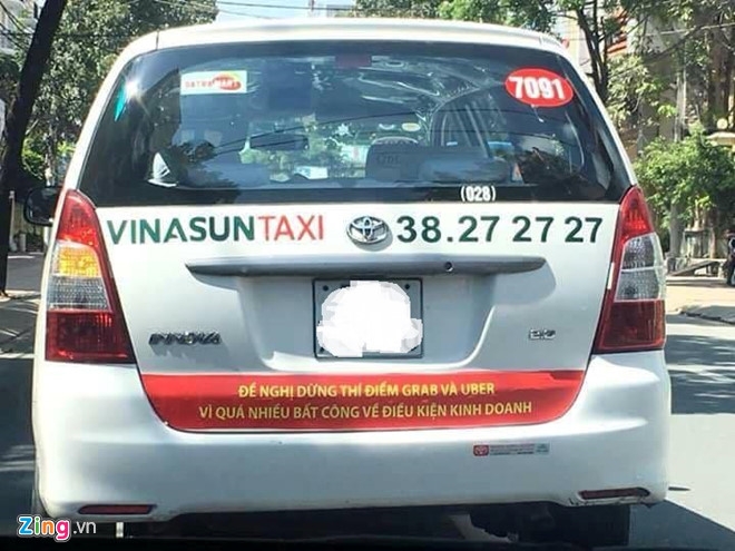  Bung no taxi dan khau hieu phan doi Uber, Grab hinh anh 1