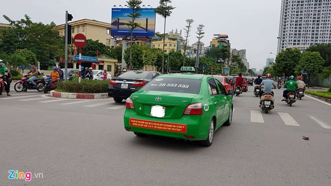  Bung no taxi dan khau hieu phan doi Uber, Grab hinh anh 3