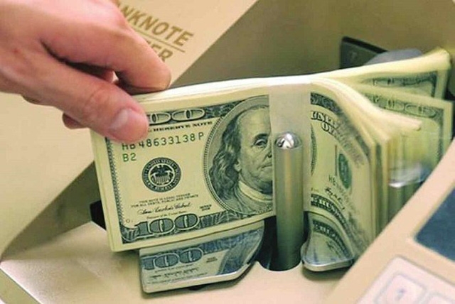 Vì sao Ngân hàng Nhà nước liên tiếp giảm giá mua USD? - Ảnh 1.