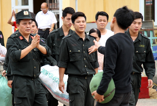 Cong an Ha Noi keu goi nguoi bat giu can bo o Dong Tam dau thu hinh anh 1