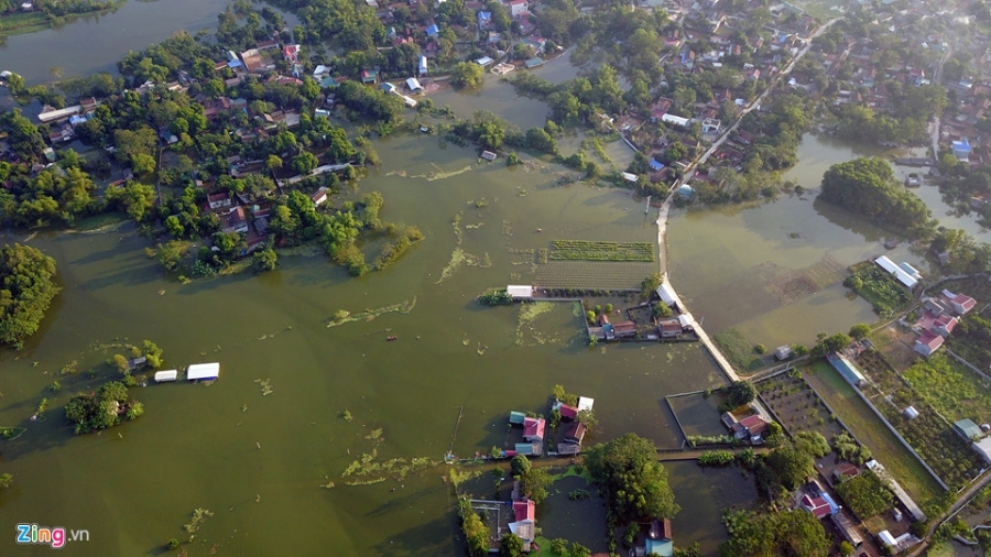 Nuoc van chua rut, dan Ha Noi che be 'dac chung' hinh anh 2