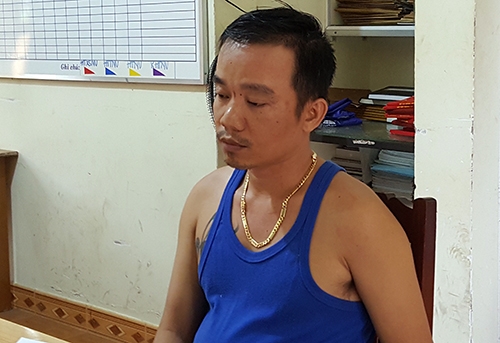 Cường bị bắt sau 2 giờ tử thủ trong phòng trọ nạn nhân. Ảnh: Khánh Hương