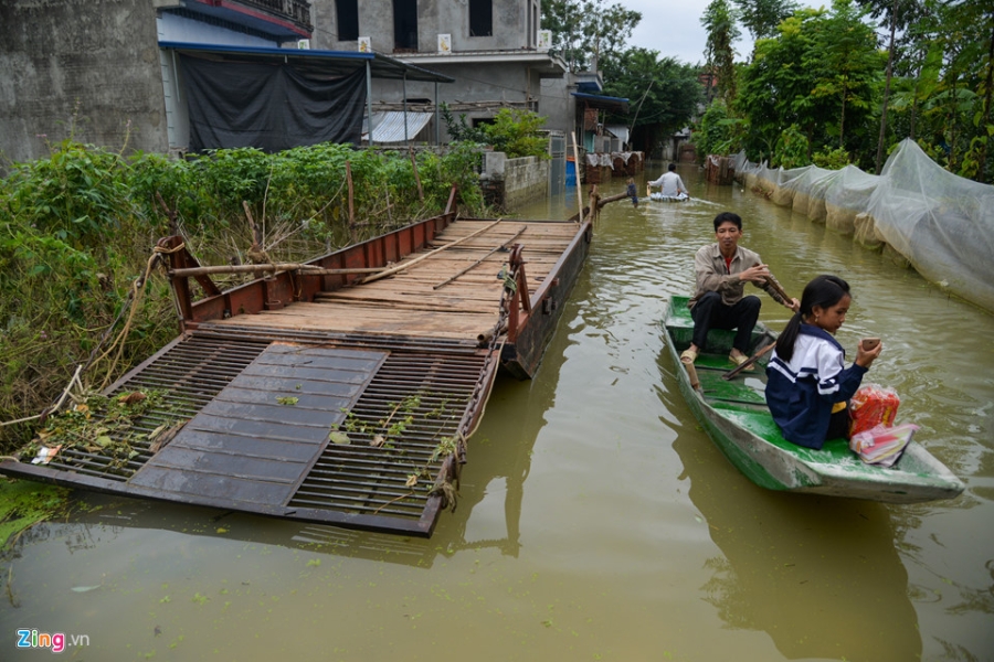 Don bun dat sau 6 ngay song tren song hinh anh 15