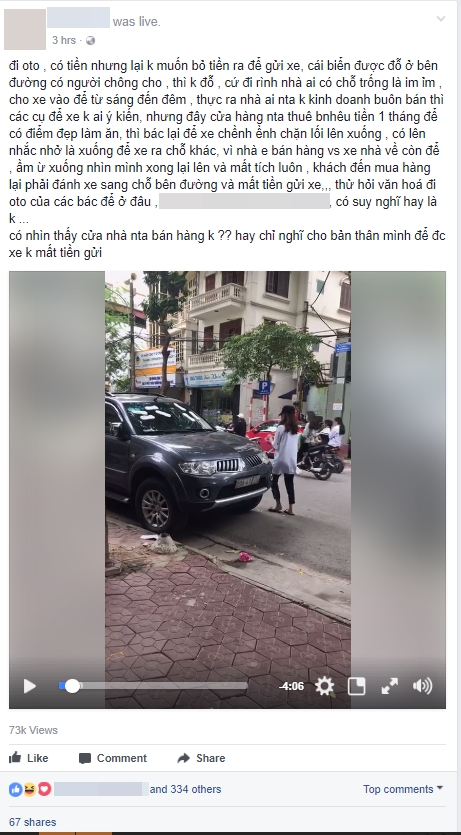 Cô gái trẻ livestream dán băng vệ sinh quanh ô tô vì đỗ trước cửa hàng trên phố Hà Nội gây tranh cãi - Ảnh 1.