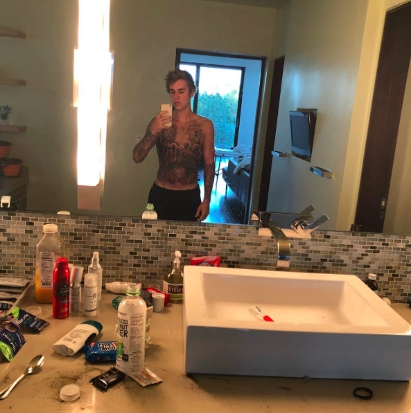 Justin Bieber chinh thuc xam kin nguoi hinh anh 1